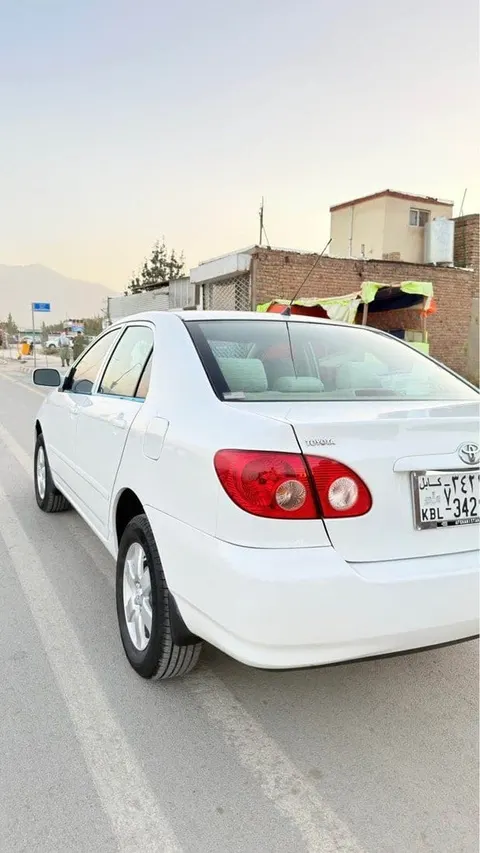 Toyota Corolla 2007 American, White, Company Warranty