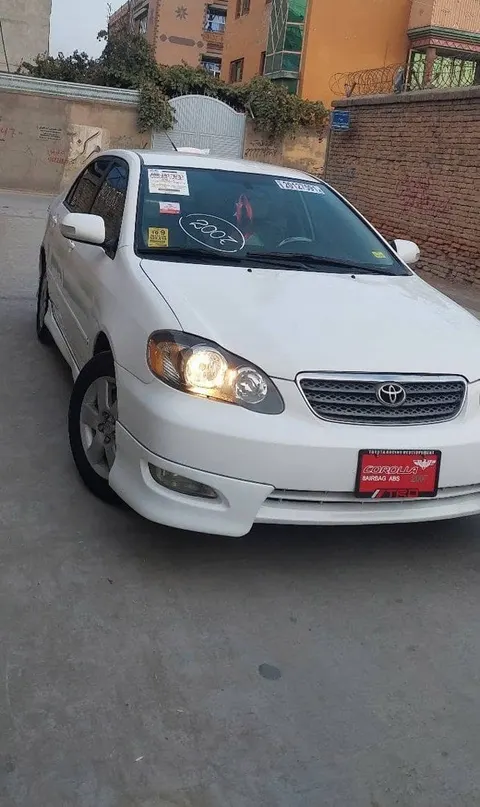 تویوتا کرولا آمریکایی ۲۰۰۷ سفید، پطرول، اتومات