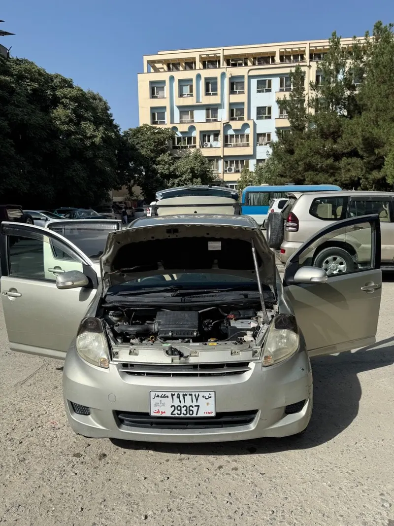 تویوتا پاسو 2009 - زرین (1)