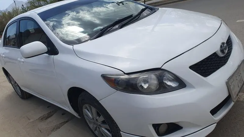 Toyota Corolla 2010, white, low consumption (1)