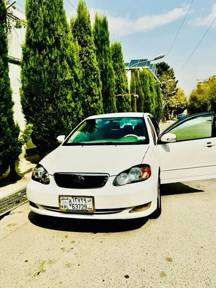 2006 LE Sedan, white, full options (1)
