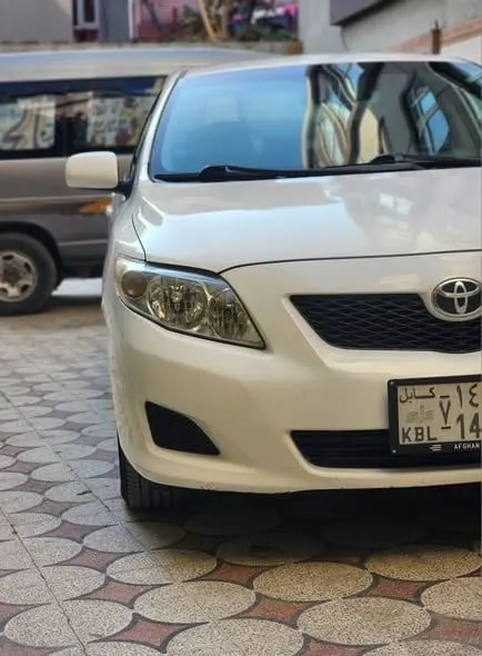Toyota Corolla 2010 LE White, Newly Imported, No Accident (2)