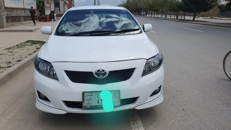 Toyota Corolla 2010, white, low consumption (2)