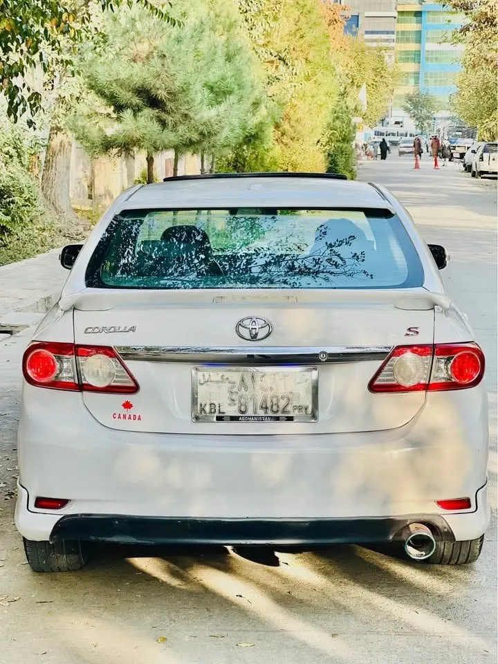 Toyota Corolla Canadian 2009, White, Sunroof, S Sport - 5800 USD (2)