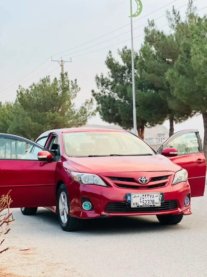 Toyota Corolla LE 2009, Automatic, 4-Cylinder Petrol, Red - 3900 USD (1)
