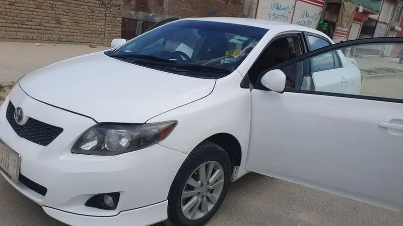 Toyota Corolla 2010, white, low consumption (4)