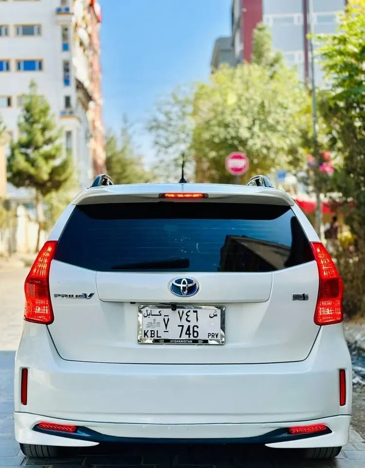 Toyota Prius V 2013 White, Hybrid Family Car, Kabul (2)