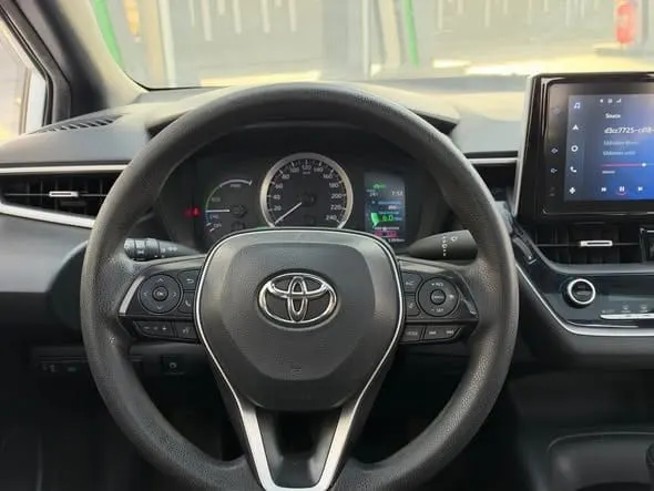 Toyota Corolla Hybrid 2023, Sunroof, White, Registered Kabul Documents (2)