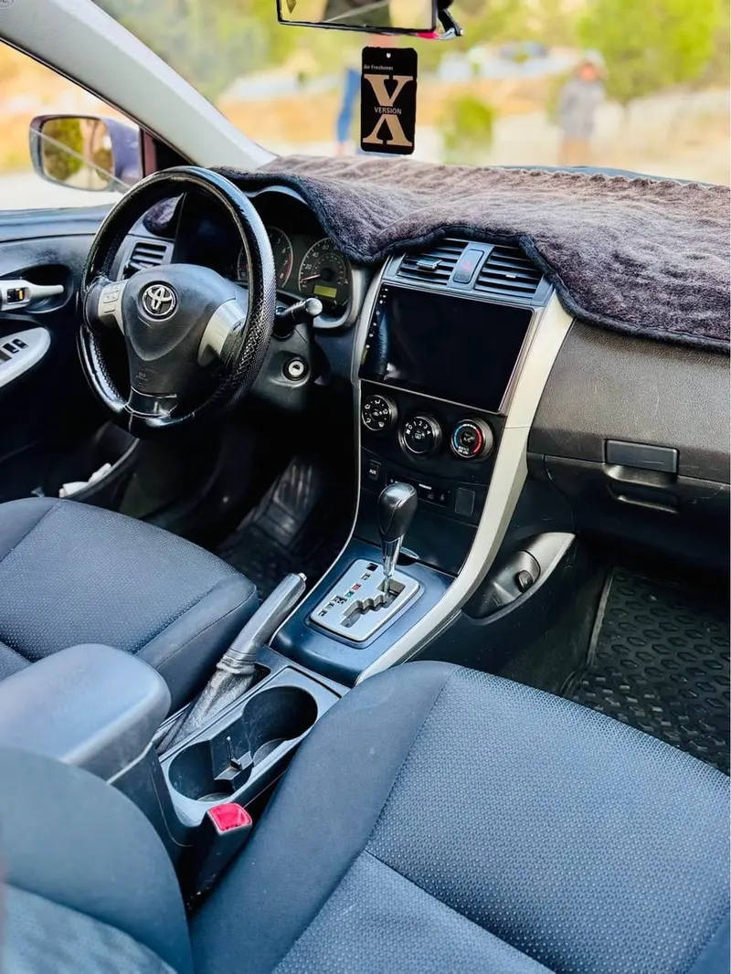Toyota Corolla 2009 Canadian White Automatic (4)
