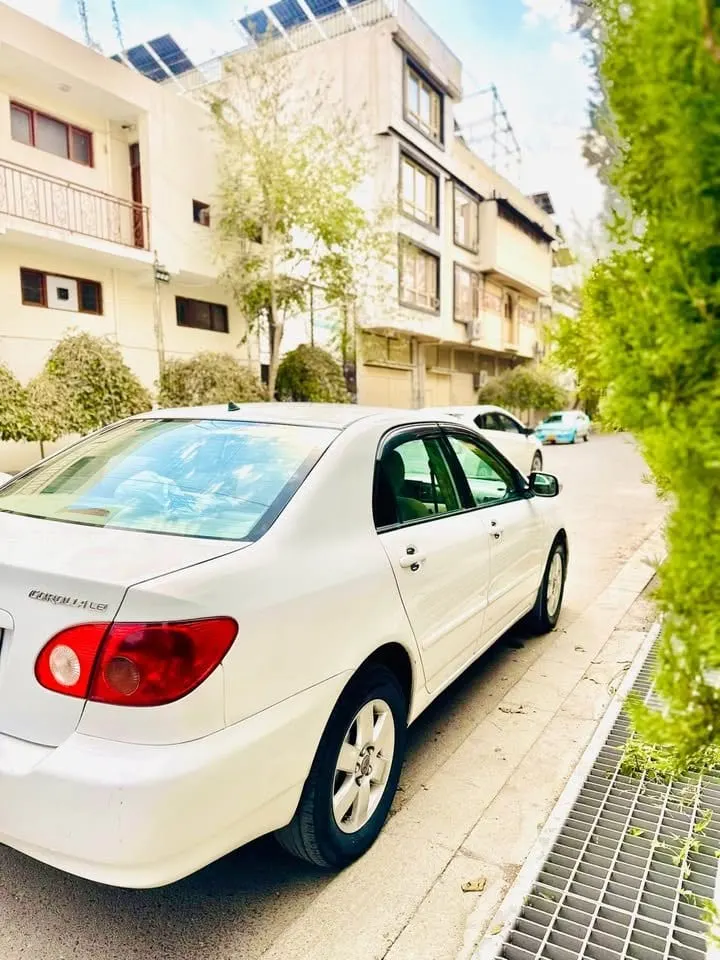 2006 LE Sedan, white, full options (3)