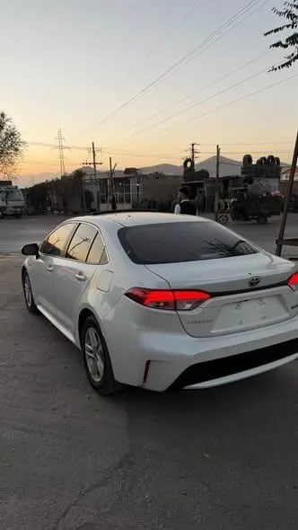 Toyota Corolla Hybrid 2023, Sunroof, White, Registered Kabul Documents (3)