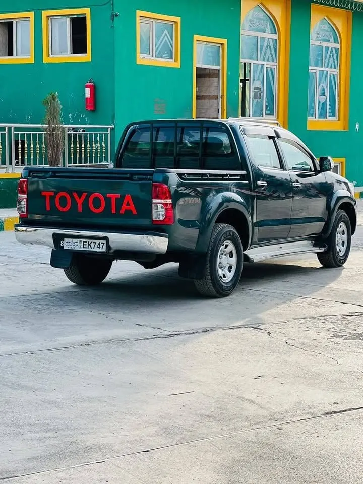 Toyota Hilux 2006, 2012 chassis, green, petrol, no accident (4)
