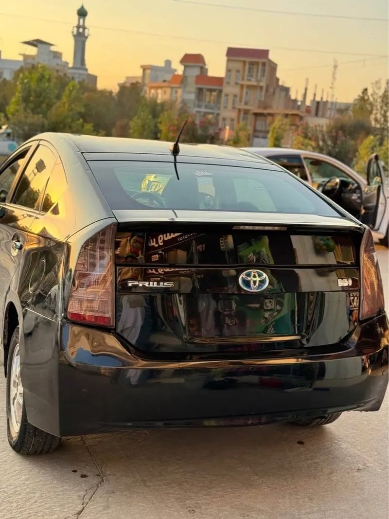 تویوتا پریوس ۲۰۱۰ سیاه، هیبرید، کم مصرف، خانگی (5)