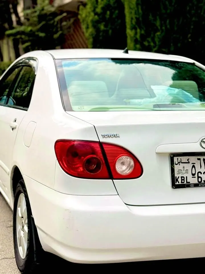 2006 LE Sedan, white, full options (5)