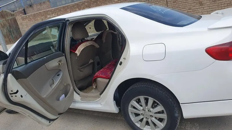 Toyota Corolla 2010, white, low consumption (5)