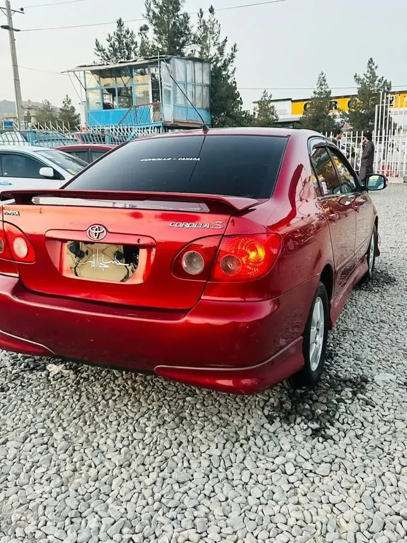 تویوتا کرولا اسکلاس مدل ۲۰۰۵ رنگ جگری (5)
