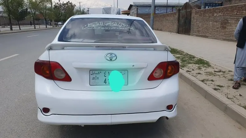 Toyota Corolla 2010, white, low consumption (3)
