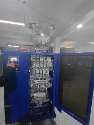 MACHINE À BONBONS EN BÂTONNETS