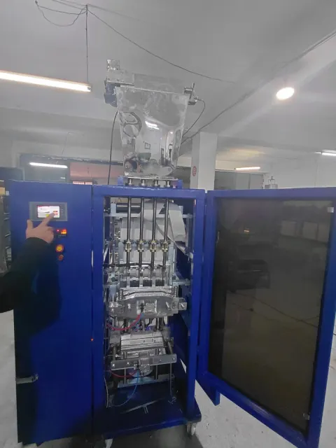 MACHINE À BONBONS EN BÂTONNETS